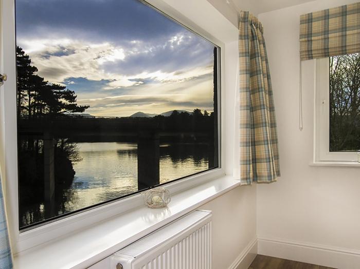 Waterside in Menai Bridge, Anglesey, with views of the River Cadnant and the Menai Straits. Parking.