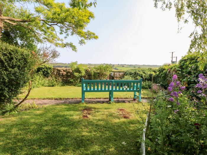 Ivy Cottage in Ingleton, County Durham. Dog-friendly. Enclosed rear garden. WiFi and three bedrooms.