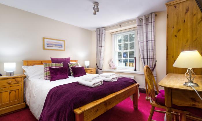 Birchcroft in Ambleside, Cumbria. Permit parking. Two bedrooms, two bathrooms, 1 pet. Near amenities