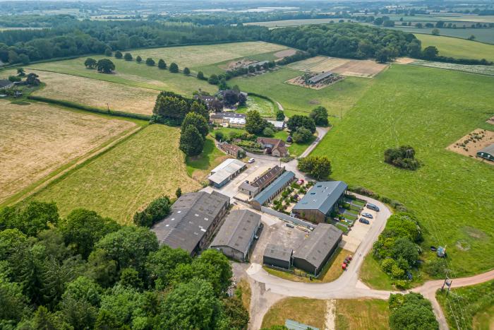 Leafield House in Upper Seagry, Wiltshire. Hot tub. Cinema room. Library. Freestanding bath. Luxury.