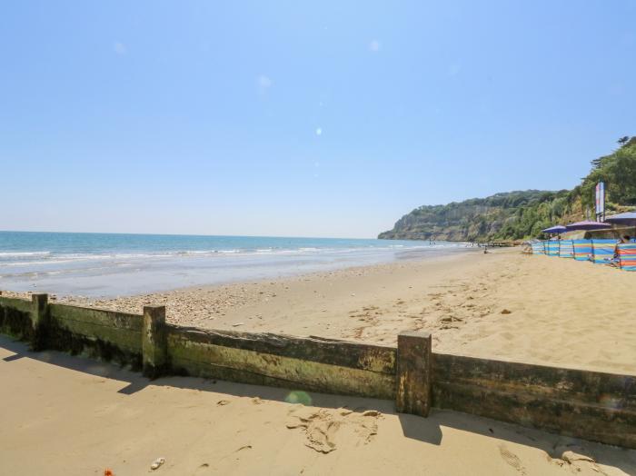 7 Hope Road rests in Shanklin, upon Isle of Wight. Three-bedroom home with sea glimpses. Near beach.