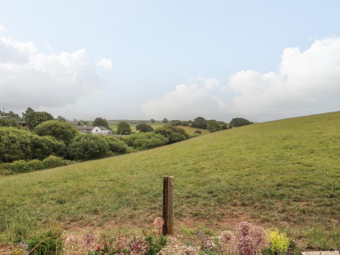 Blake Cottage, is in Pelynt, Cornwall. Enclosed garden. Parking. Couples retreat. Woodburning stove.