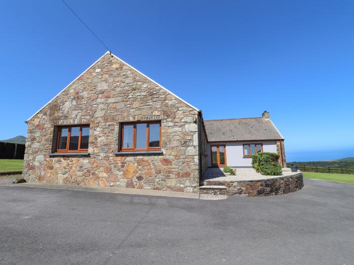 Gorwelfa rests in Nevern, Pembrokeshire. Enclosed garden. Off-road parking. Sea views. Single-storey