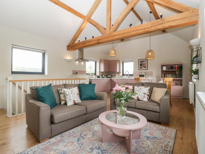 Sevenwoods View in Longhope, Gloucestershire, reverse-level, dog-friendly, off-road parking, garden.