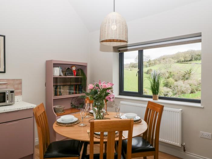 Sevenwoods View in Longhope, Gloucestershire, reverse-level, dog-friendly, off-road parking, garden.