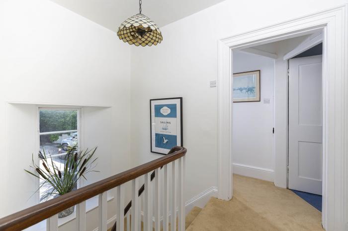 Cliff Cottage rests in Galmpton, Devon. Five-bedroom home with stunning views over River Dart. Large