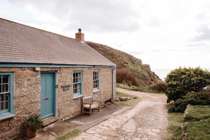 Cove Cottage is in Porthgwarra, Cornwall. Grade II listed home with pet-friendly policy. Near beach.