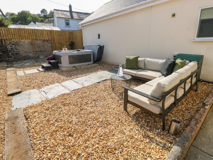 Teifi Villa in St Dogmaels, in Pembrokeshire. Enclosed garden, hot tub, off-road parking, two pets.