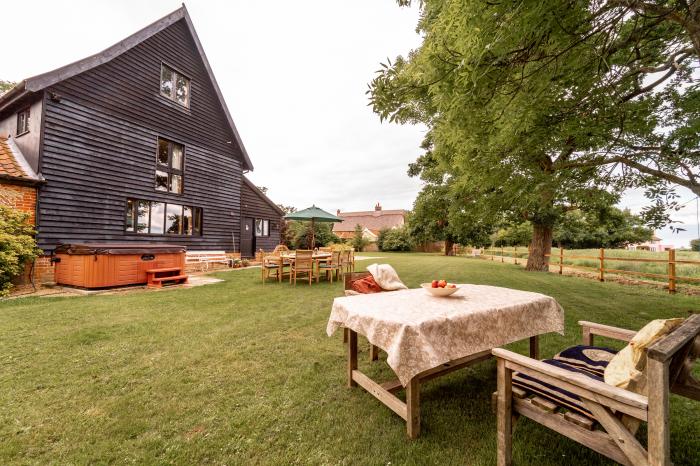 Manor Farm Barn is a glorious, 17th-century barn conversion in Thorndon, Suffolk. Hot tub. Character