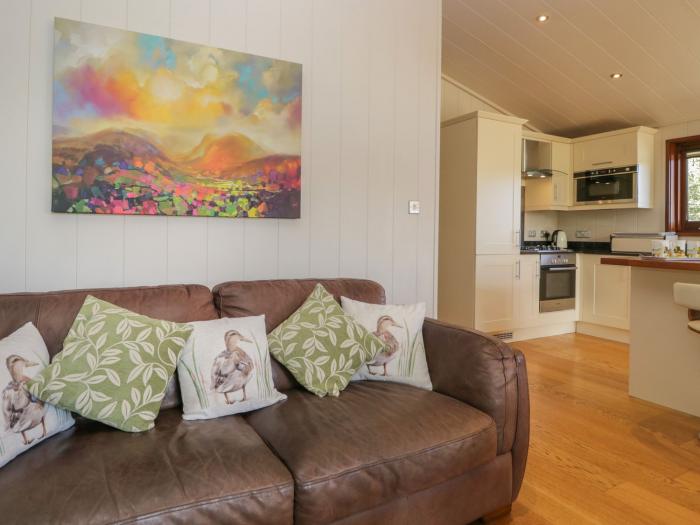 Leafy Nook is in Hawkshead, in Cumbria. Three-bedroom lodge with woodburning stove. In National Park