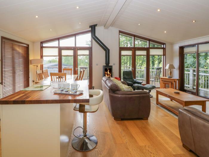 Leafy Nook is in Hawkshead, in Cumbria. Three-bedroom lodge with woodburning stove. In National Park