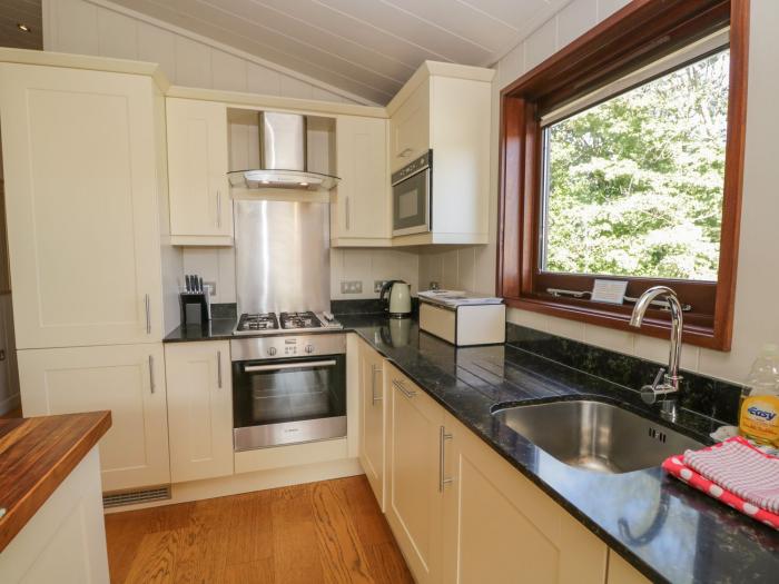 Leafy Nook is in Hawkshead, in Cumbria. Three-bedroom lodge with woodburning stove. In National Park