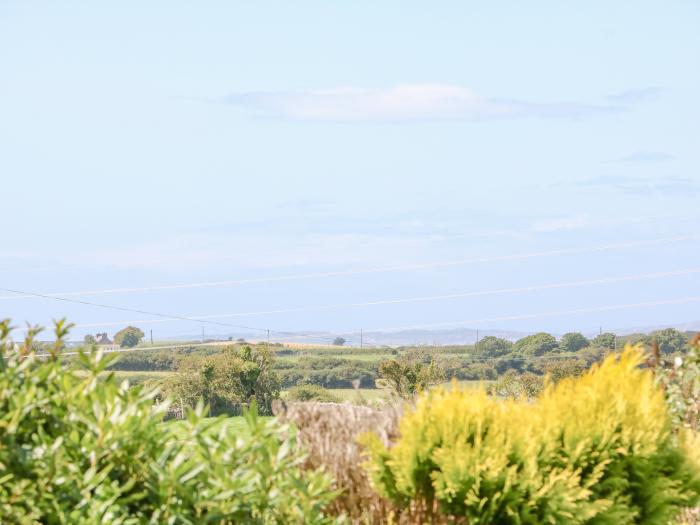 Awelfryn is nr Llanddeusant, Anglesey. Three-bedroom home with enclosed garden. Near AONB. Stylish.