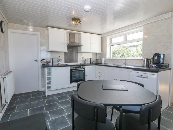 Awelfryn is nr Llanddeusant, Anglesey. Three-bedroom home with enclosed garden. Near AONB. Stylish.