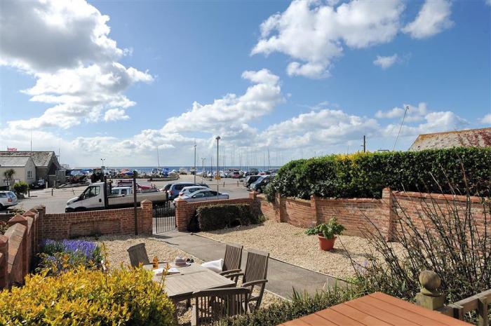 2 Cobb View, Lyme Regis, Dorset. Close to a shop, pub, and a beach. Jurassic Coast. Communal garden.