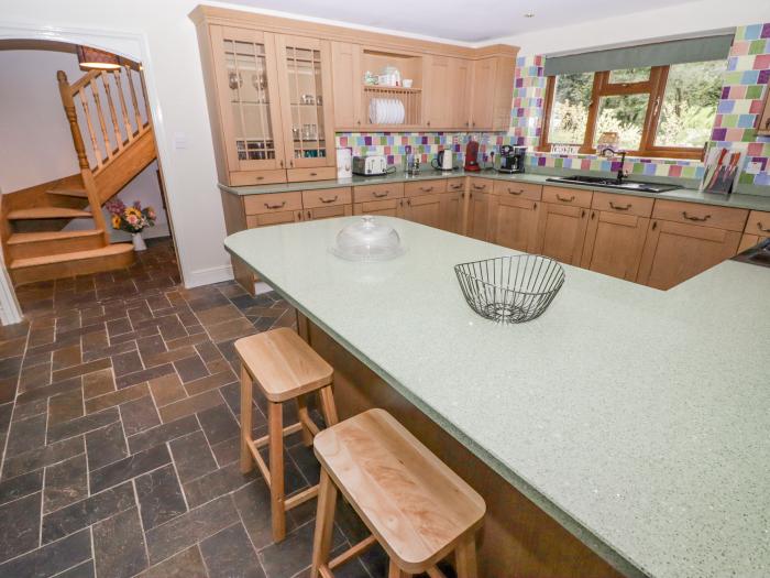 Hafan Dawel, is near Newcastle Emlyn, Pembrokeshire. Four-bedroom home with games room. Rural. Pets.