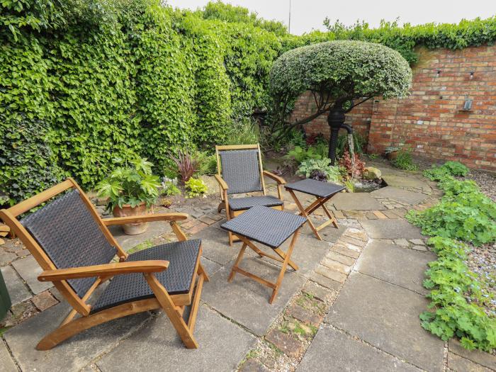 Hangmans Cottage is in Horncastle, Lincolnshire. Character. Smart TV. Woodburning stove. One bedroom