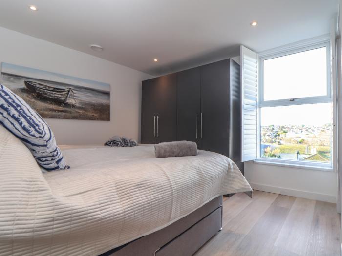 Sailors, Falmouth, Cornwall. Set over 3 floors. Open-plan living space. Woodburning stove. En-suites