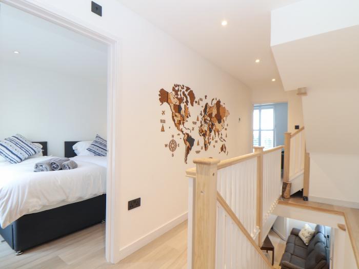 Sailors, Falmouth, Cornwall. Set over 3 floors. Open-plan living space. Woodburning stove. En-suites