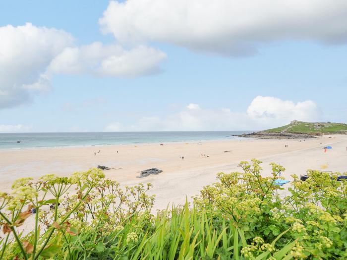 Beach Haven, St Ives, Cornwall. Off-road parking. Close to a beach, shop and a pub. Enclosed garden.