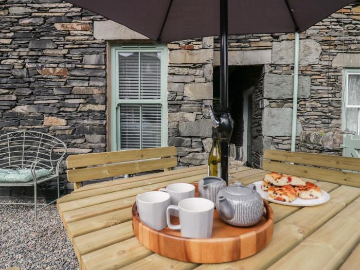 Rose Cottage, Ambleside, Cumbria. Close to local amenities. Woodburning stove. Riverside. Four beds.