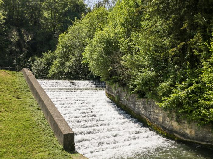 Lakeside Mill Cottage in Nailsworth, Cotswolds. In an AONB. Off-road parking. 2bed