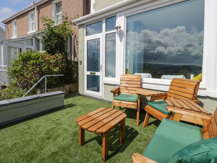 Jasmine Villa, Llandudno, Conwy. Elevated position with sea views. 2-beds. Terrace. Off-road parking