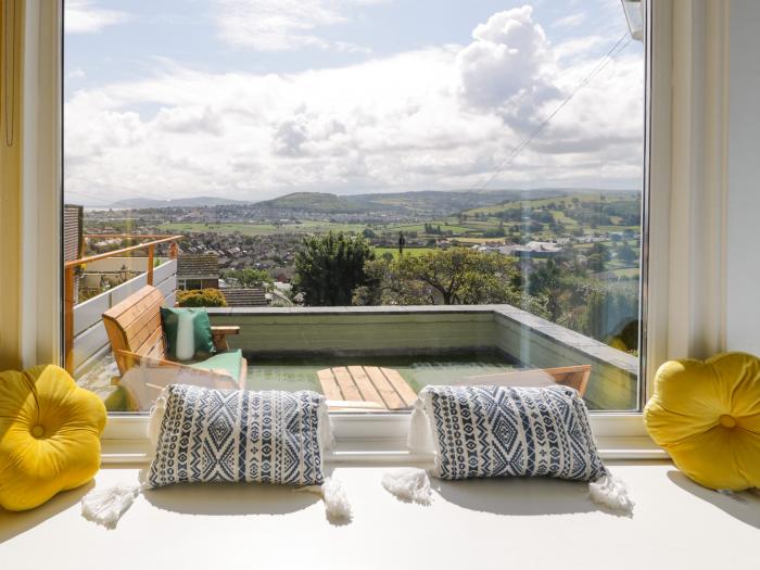 Jasmine Villa, Llandudno, Conwy. Elevated position with sea views. 2-beds. Terrace. Off-road parking