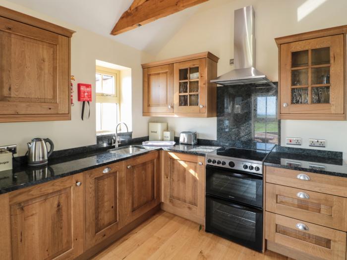 Smithy Cottage, Embleton, Northumberland. Single-storey cottage with an open-plan living space. WiFi