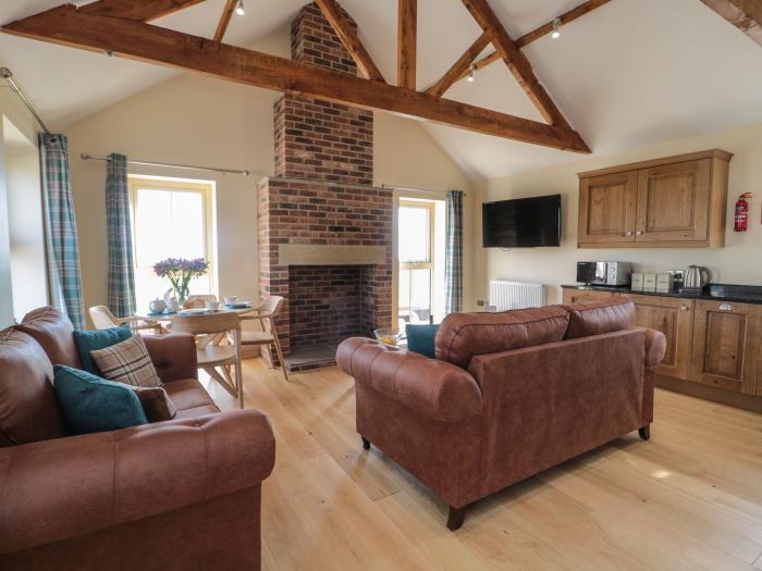 Smithy Cottage, Embleton, Northumberland. Single-storey cottage with an open-plan living space. WiFi