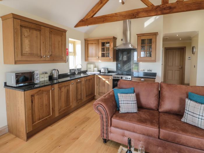 Smithy Cottage, Embleton, Northumberland. Single-storey cottage with an open-plan living space. WiFi