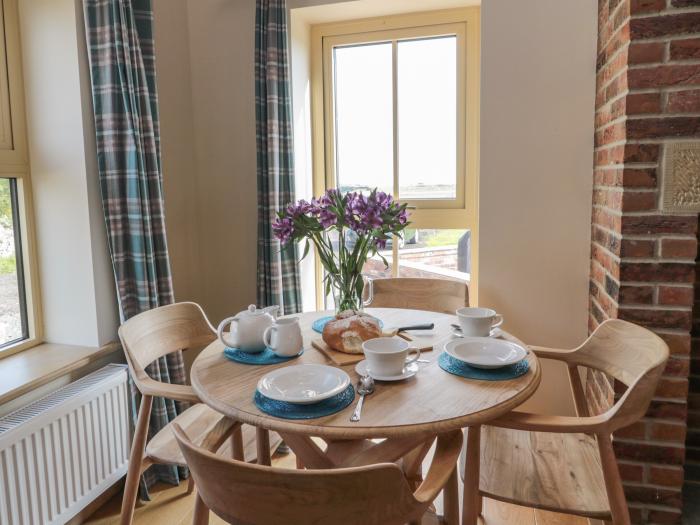 Smithy Cottage, Embleton, Northumberland. Single-storey cottage with an open-plan living space. WiFi