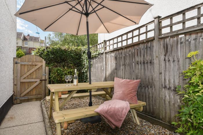 River Lym Cottage, Lyme Regis, Dorset. Garden & patio. Off-road parking. Two bedrooms. Pet-friendly.