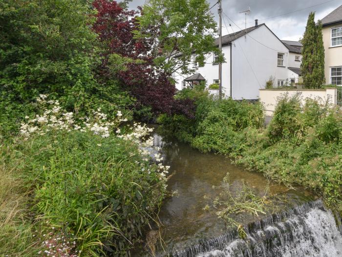 River Lym Cottage, Lyme Regis, Dorset. Garden & patio. Off-road parking. Two bedrooms. Pet-friendly.