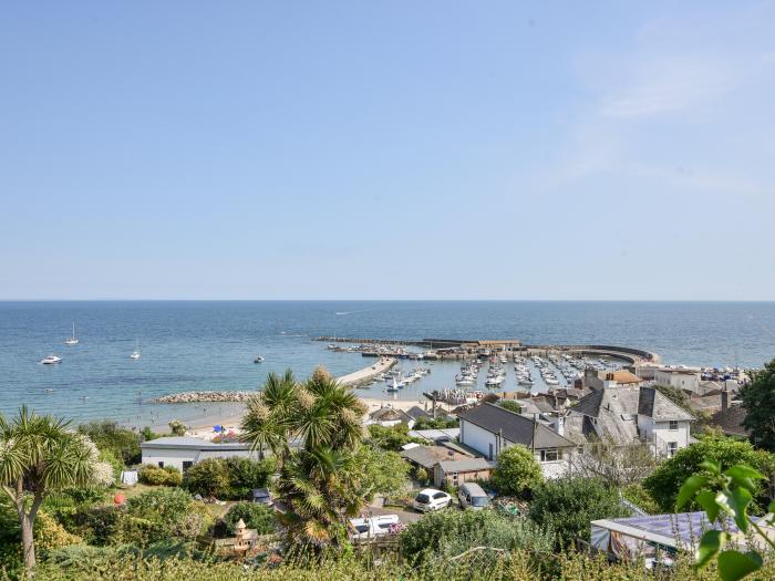 River Lym Cottage, Lyme Regis, Dorset. Garden & patio. Off-road parking. Two bedrooms. Pet-friendly.