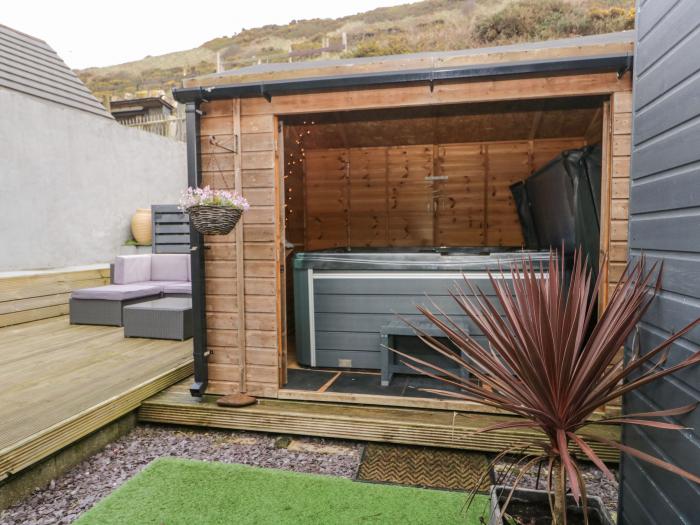 The Chalet is near Egremont, Cumbria. Single-storey chalet, overlooking Isle of Man. Pet-free. Rural