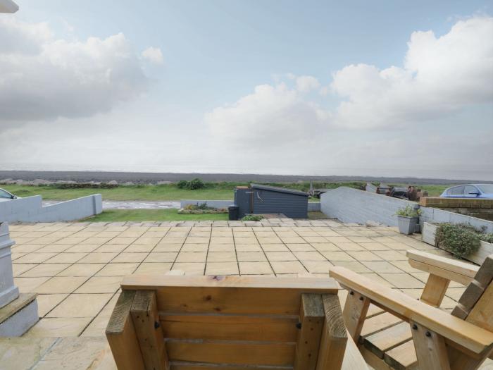 The Chalet is near Egremont, Cumbria. Single-storey chalet, overlooking Isle of Man. Pet-free. Rural