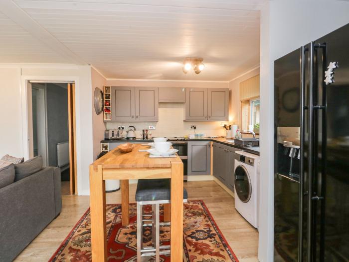 The Chalet is near Egremont, Cumbria. Single-storey chalet, overlooking Isle of Man. Pet-free. Rural