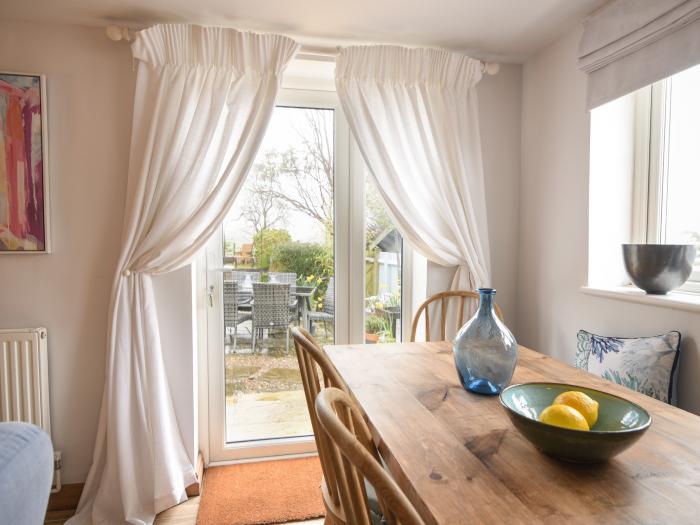 Meadow Cottage, Charmouth, Dorset, close to amenities and the beach, pet-friendly, stylish, gardens,