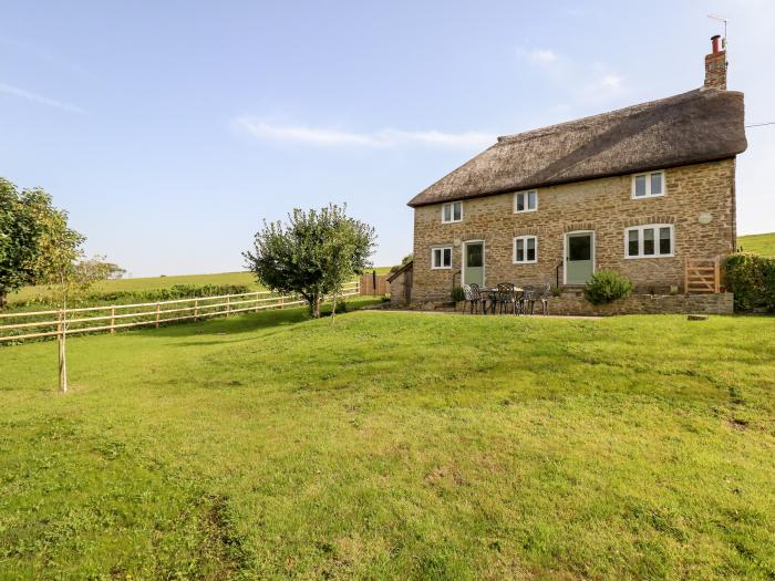 Dairy Cottage nr Abbotsbury, Dorset. Three-bedroom, thatched cottage with rural views. Pet-friendly.