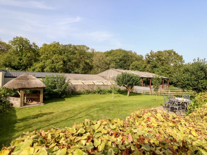 Dairy Cottage nr Abbotsbury, Dorset. Three-bedroom, thatched cottage with rural views. Pet-friendly.