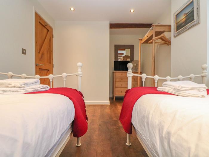 The Old Smokehouse, in Charlestown, Cornwall. Pet-friendly. Enclosed garden. Open-plan living. 2bed.