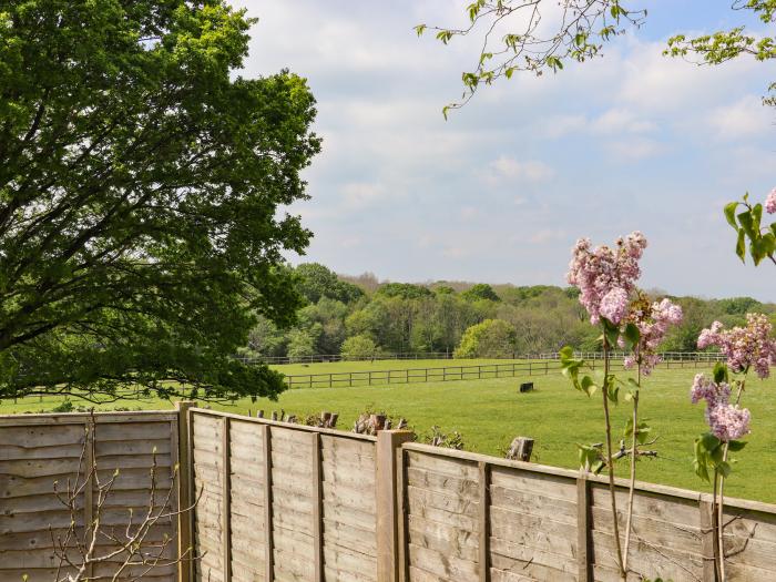 Six Acres House near Peasmarsh, East Sussex. Three-bedroom cottage with pet-friendly garden. In AONB