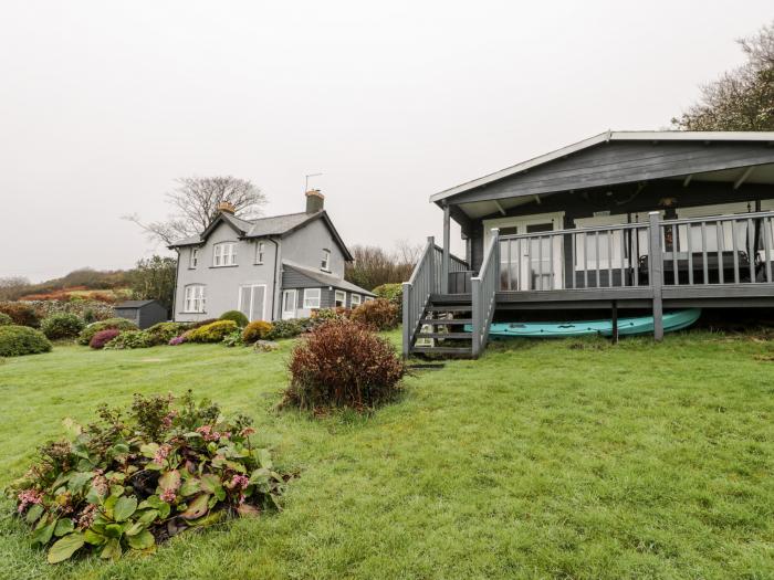 Sibrwd Y Mor in Harlech, Wales, in a National Park, off-road parking, enclosed garden, summer house.