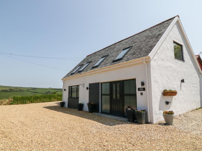 Willow Cottage in Combe Martin, Devon. Stylish, two-bedroom home, with en-suite bedrooms and garden.