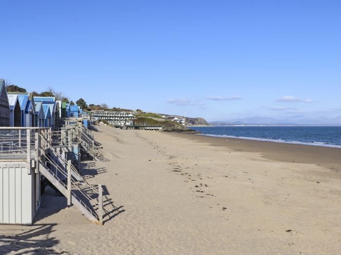 Cowshed in Abersoch, Gwynedd. One bedroom sleeping two guests. Enclosed garden, one pet, near beach.