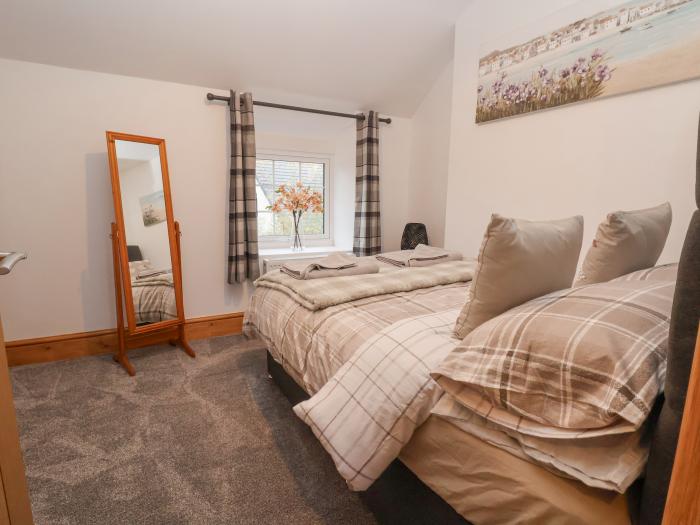 11 Wind Street rests in Conwy, North Wales. Two-bedroom home near amenities and attractions. Central