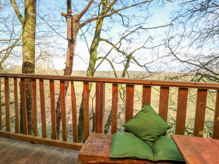 Tree House, Aberaeron, coastal holiday, close to beaches, enclosed veranda and off-road parking.