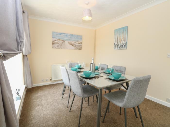 The Look Out, in Sea Palling, Norfolk. First-floor apartment with sea views. Near amenities & beach.