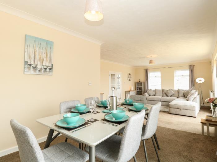 The Look Out, in Sea Palling, Norfolk. First-floor apartment with sea views. Near amenities & beach.